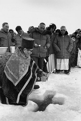 Father Guest blesses the waters for a prosperous fishing season in the coming year, Napaskiak.